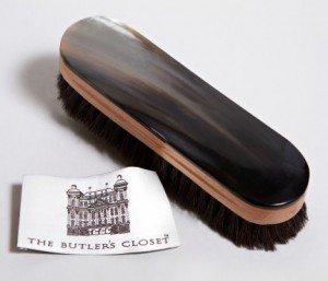 Horn clothes brush